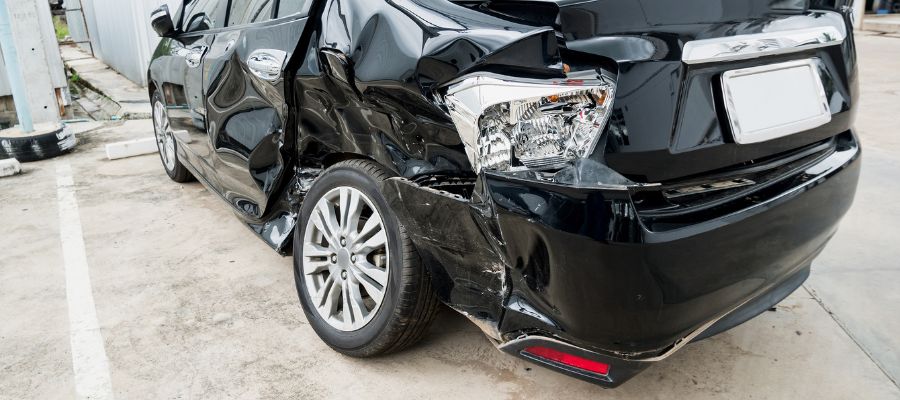 Gets Damaged During Transport - a close-up of a damaged car